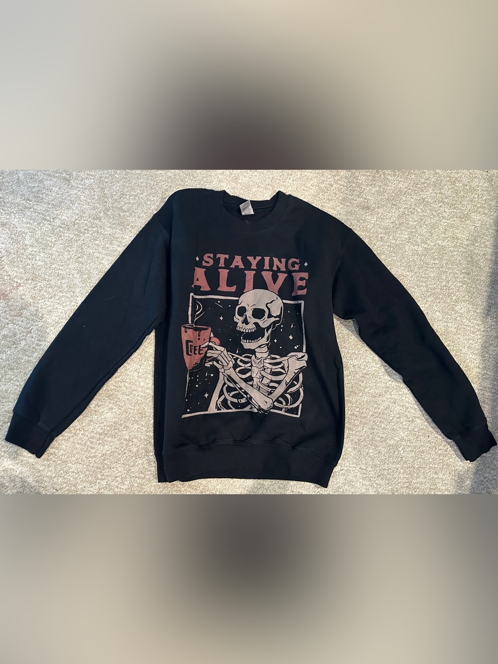 “Staying Alive” graphic print Halloween skeleton coffee crewneck sweatshirt